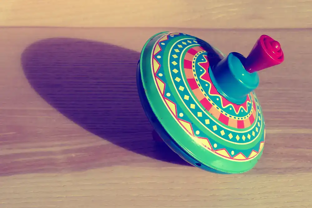 Colorful wooden spinning tops